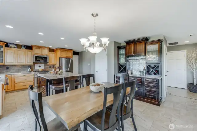 Coffee/Wine bar is an added bonus with frosted glass doors, Wine Shelving & wine glass racks.