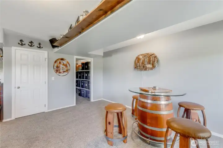 Massive storage with shelving & wine rack stays. Wine Barrel Table and Chairs are Negotiable.
