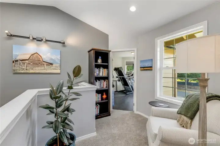 Upstairs landing connects bonus room, primary suite, 2 additional bedrooms & laundry Upstairs landing connects bonus room, primary suite, 2 additional bedrooms & laundry