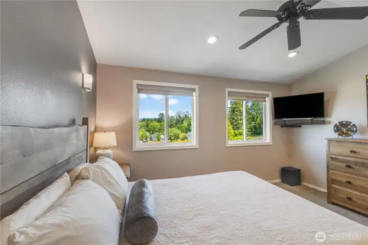 Wake up in the morning with views of Mt. Rainer. The primary has auto smart blinds & new carpet