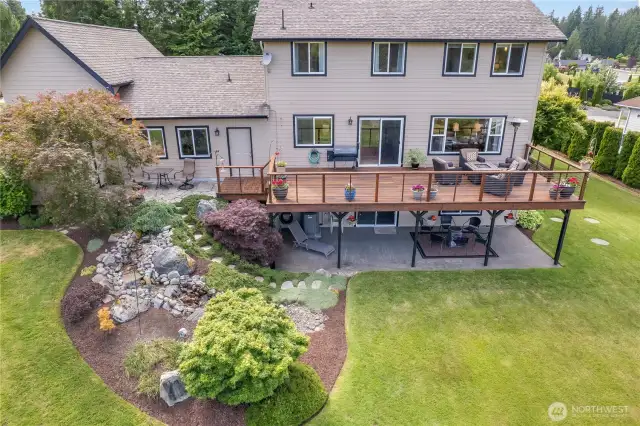 Enjoy the beautiful waterfall feature from the back deck, patio & a semi-private flagstone seating area. No need to refill the water, it is on autofill. Just sit back and enjoy.