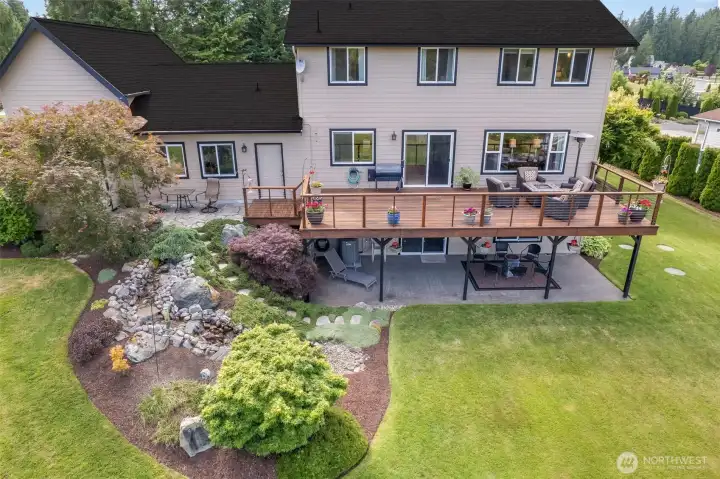 Views of back of home and the multi-level exterior entertaining areas