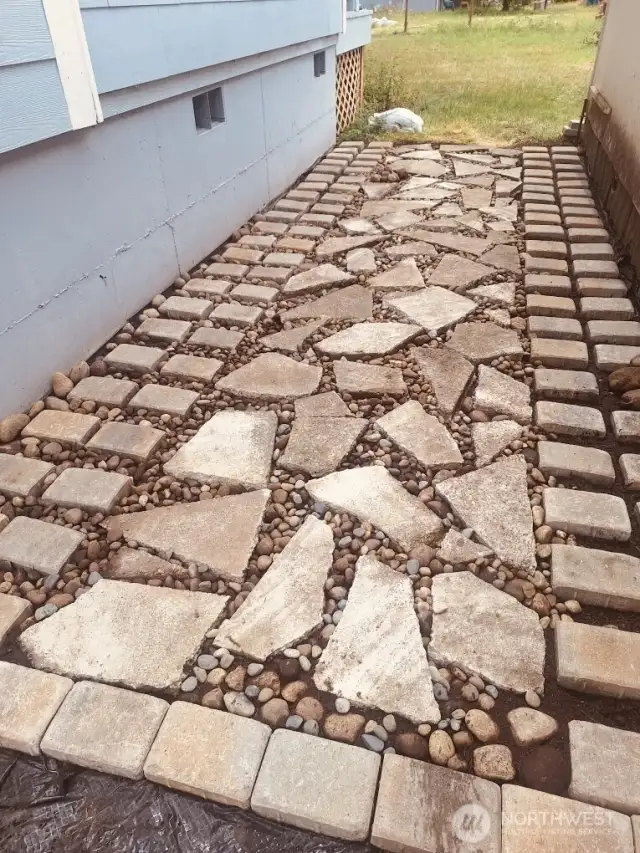 Really completed walkway between garage and house