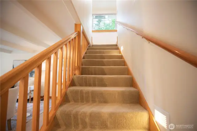 Lighted stairs with open railing