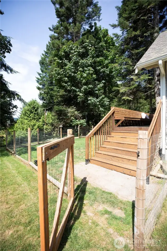 Newly stained back deck along west side of house