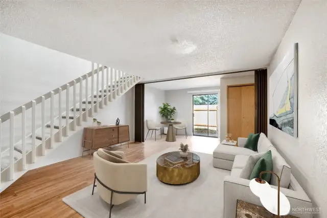 Virtual Staged!  Picture of the main floor open concept living room with partial wall to convert into 3rd bed on main floor!