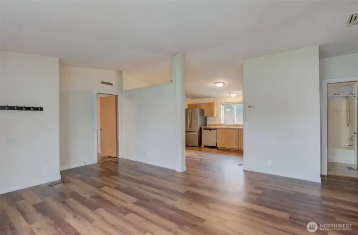 Enter into your new home. Updated vinyl plank flooring.