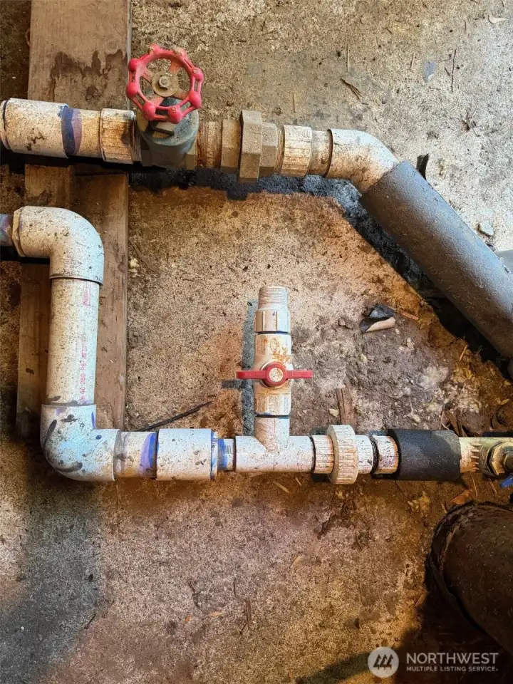 Space in well house for water hookup to this property's holding tank.