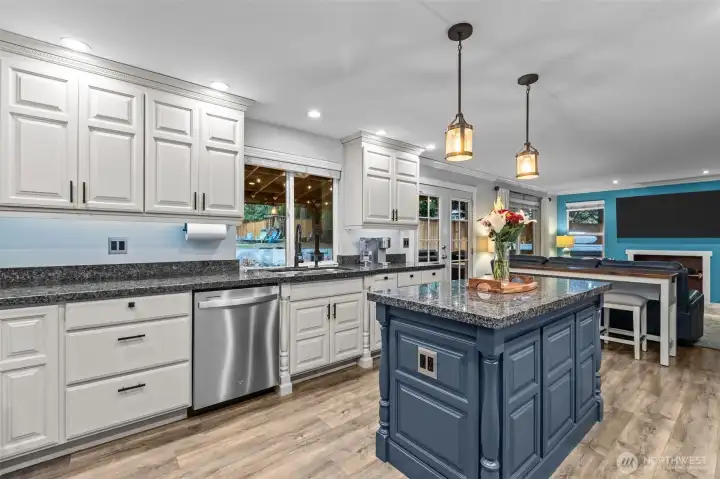 Granite countertops and custom cabinets.