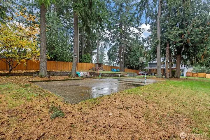 Fun and functional outdoor space with a private sport court for play or exercise.