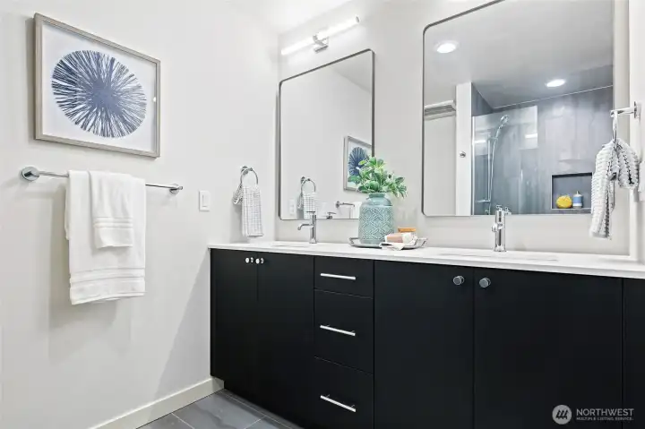 Dual vanities, modern lighting, and room to spread out — this primary bath brings spa energy home.