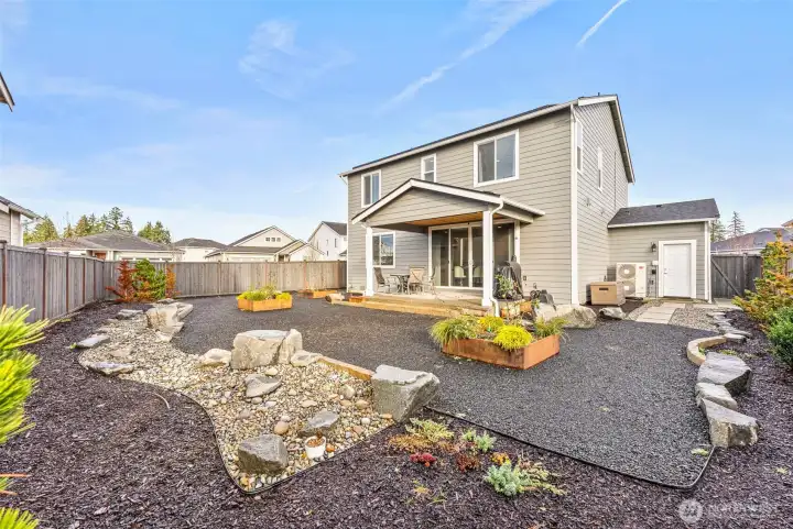 Beautifully landscaped backyard.