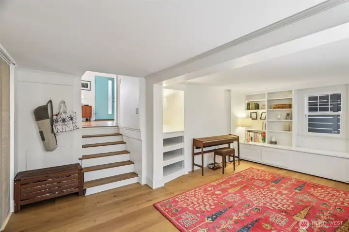 Lower level includes extensive built-ins and easy walk-out access to the backyard