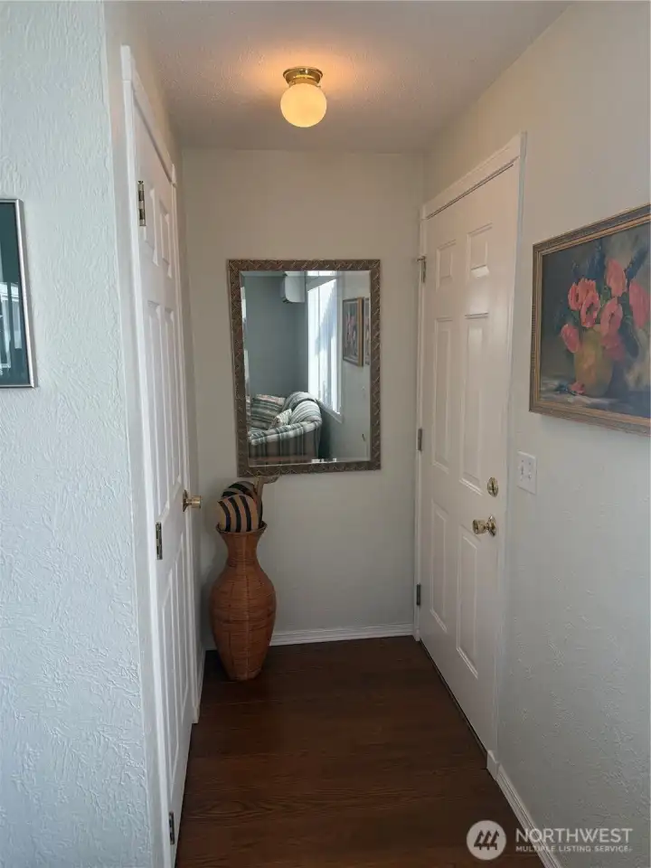 Front entry faces the coat closet and leads to the living room.