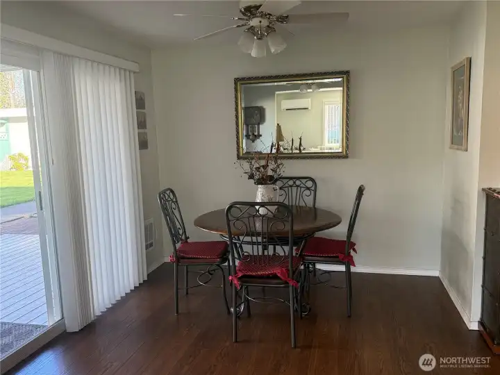 Dining room open to covered deck/ patio.