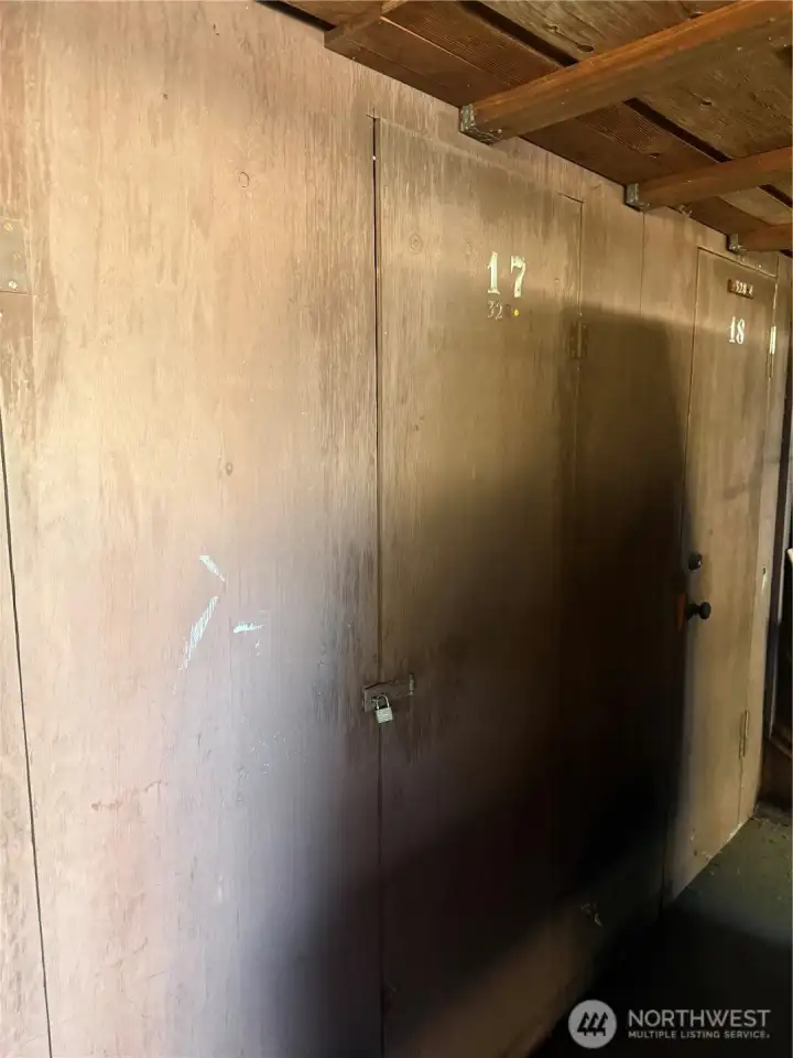 Additional storage designated for the unit that is separate from the storage space at the end of the carport storage space.