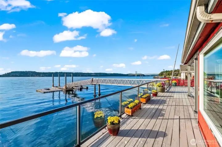 Expansive decks connect the homes, creating the perfect setting for gatherings, relaxation, and sunsets.