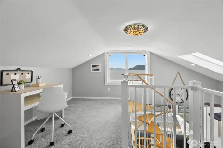 Loft area – flexible space for reading, relaxing, or working with a view.