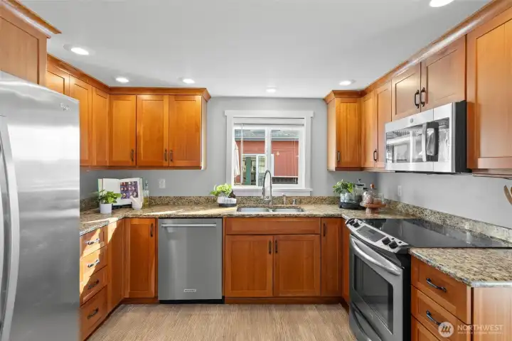Practical kitchen in the third abode, with plenty of storage and workspace.