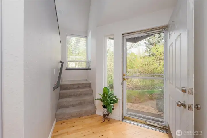Entryway allows for open space and filled with light.