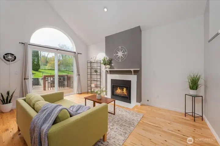 Wow right! Open space, stunning floors, and gas fireplace. Light floods in year round and allows for a warm calm atmosphere.