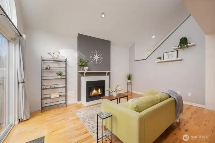 Vaulted ceiling creates movement of light and air while also being open to the stairs.