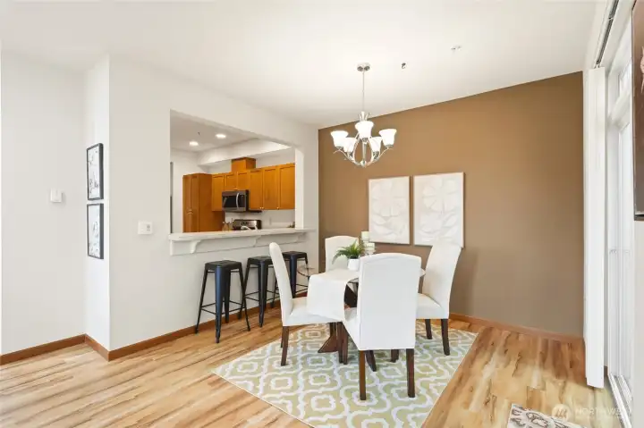 Another view of the dining room looking toward the open concept kitchen