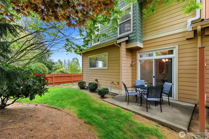 Private Patio with fully landscaped greenspace