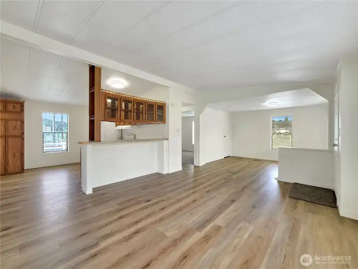 Living room, kitchen, den.
