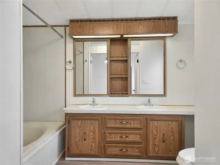 Primary bath with dual sinks and plenty of counter space for everyday convenience