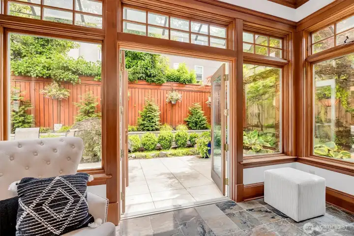 French doors from Atrium lead to private patio/backyard