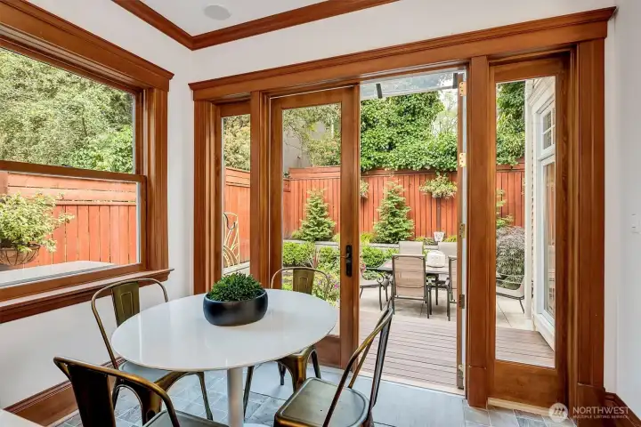 Room to eat in your light and bright kitchen, opens to dining al fresco!