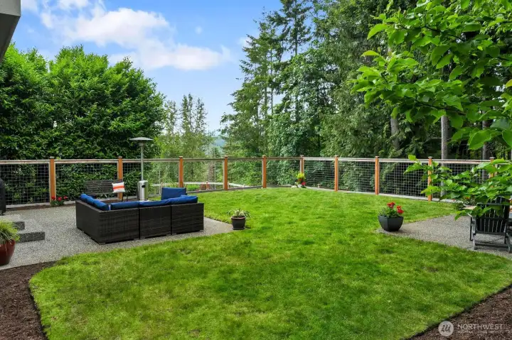 Protected greenbelt lot with peekaboo mountain views! The yard is very private from all sides.