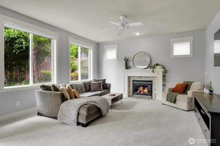 A gas fireplace brings ambiance to this recently painted greatroom.