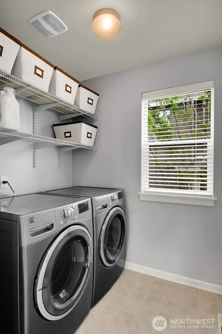 Convenient upstairs laundry. Washer and dryer convey with the home.
