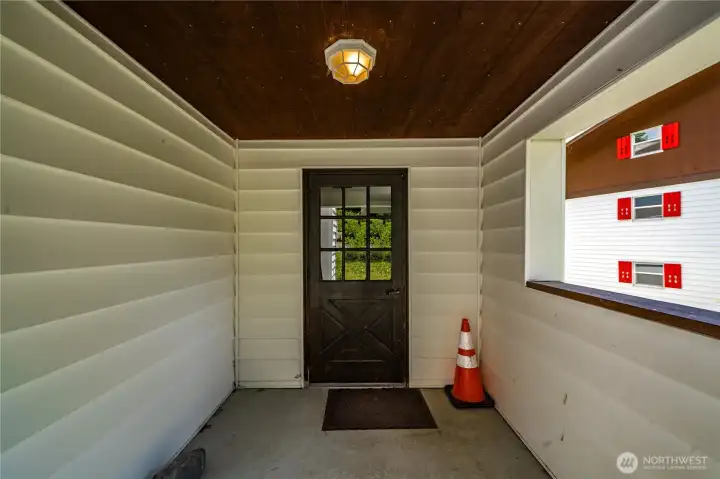 Covered entry provides convenient year-round access, rain or shine