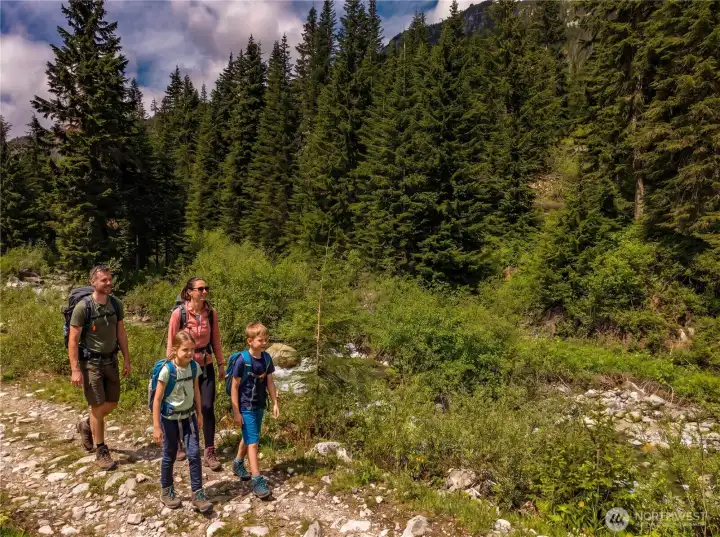 Located near some of Washington's most popular hiking destinations, including Snow Lake, Franklin Falls, Gold Creek Pond, Source Lake, and the Pacific Crest Trail. People added for illustrative purposes.
