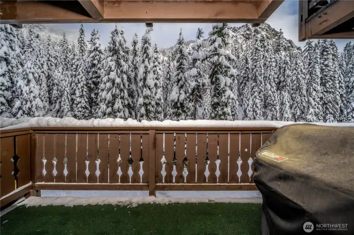 Step onto your private balcony and take in breathtaking winter views of snow-covered evergreens and rugged mountain peaks.