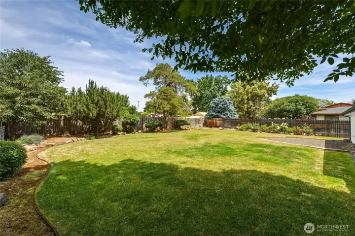 Beautifully landscaped and fully fenced in