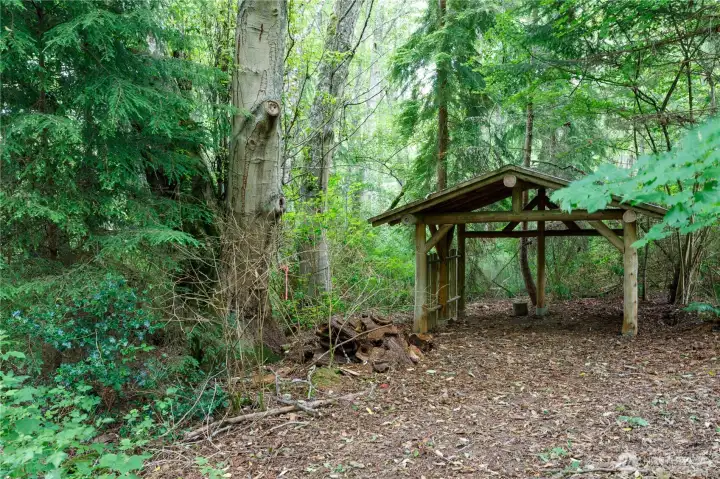 Large woodshed for your extra storage needs. Large woodshed for your extra storage needs.