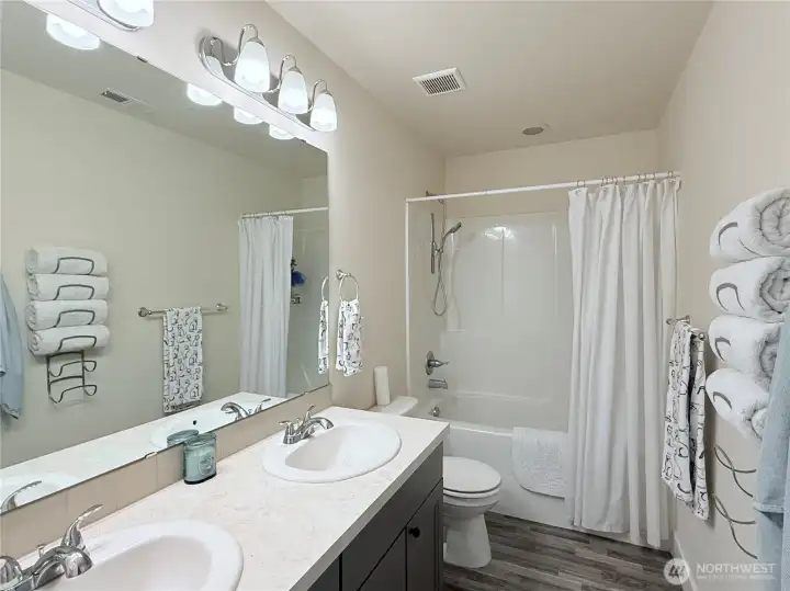 Upstairs bathroom with double vanity