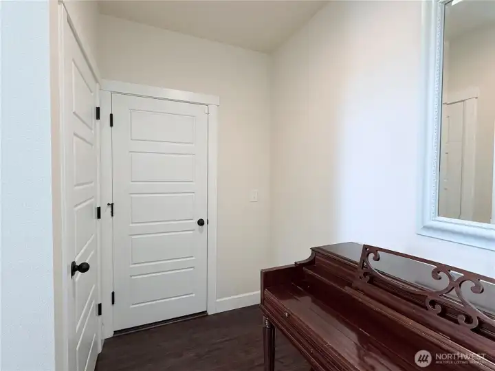 Lower level - door one is storage; door two is to the garage