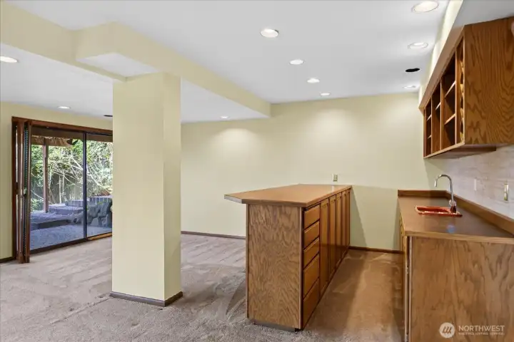 Walk out daylight basement with built-in bar and tons of storage