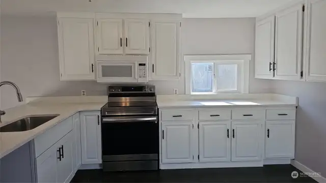 Ample space in this bright kitchen