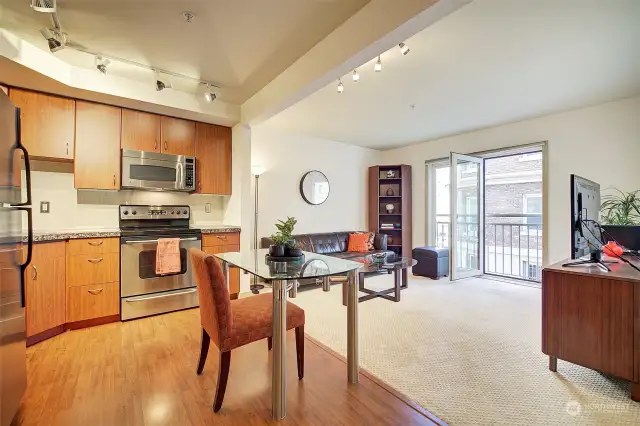 With high ceilings, abundant natural light and spaces that flow together, this one-bedroom condo seems larger than its 591 square feet.