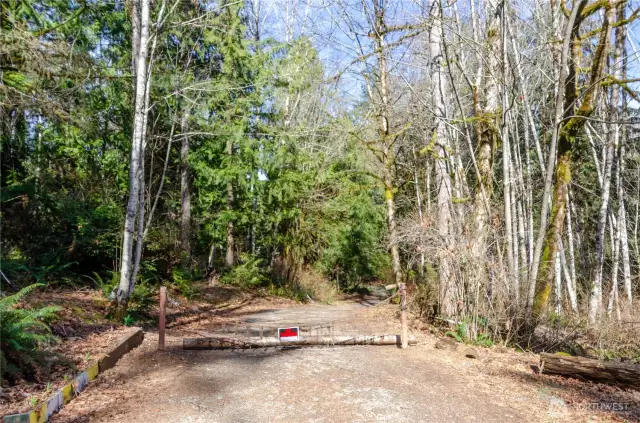 Be the owner of a little under 10 acres to make it your own private estate with your very own creek and a beautiful forest surrounding you. Entrance to the acreage