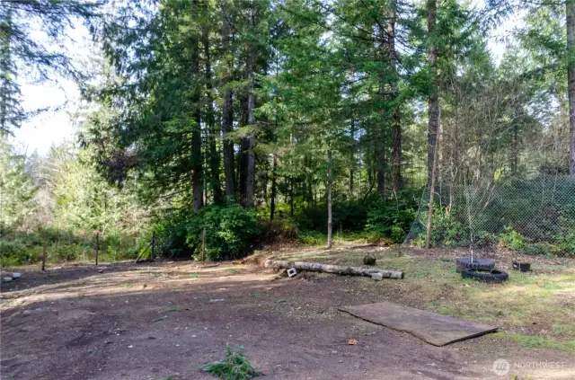 One of the cleared plateaus of this acreage for your home or shop