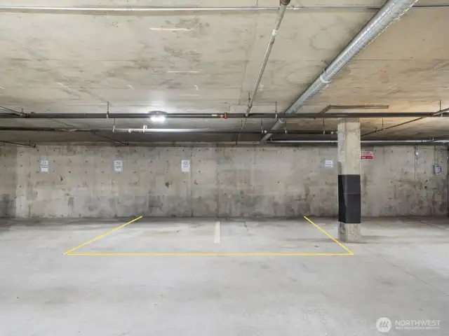This unit includes two reserved, side-by-side parking spaces in a secure, resident-only garage—complete with door ding protection thanks to a structural post on the right side. Enjoy the ease of direct building access, making entry seamless in any weather.