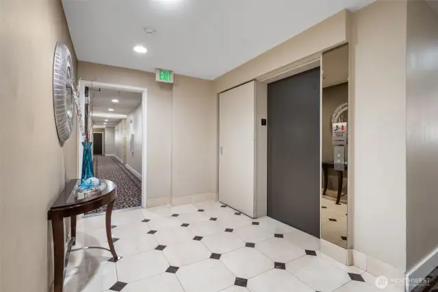 Convenient elevator access brings you right to the second floor—just steps away from Unit #206, located at the end of the hall.