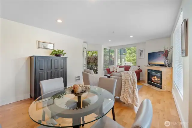 Open-concept layout connects the dining and living areas for a functional, versatile space. The neutral palette provides a flexible backdrop for any style of décor.